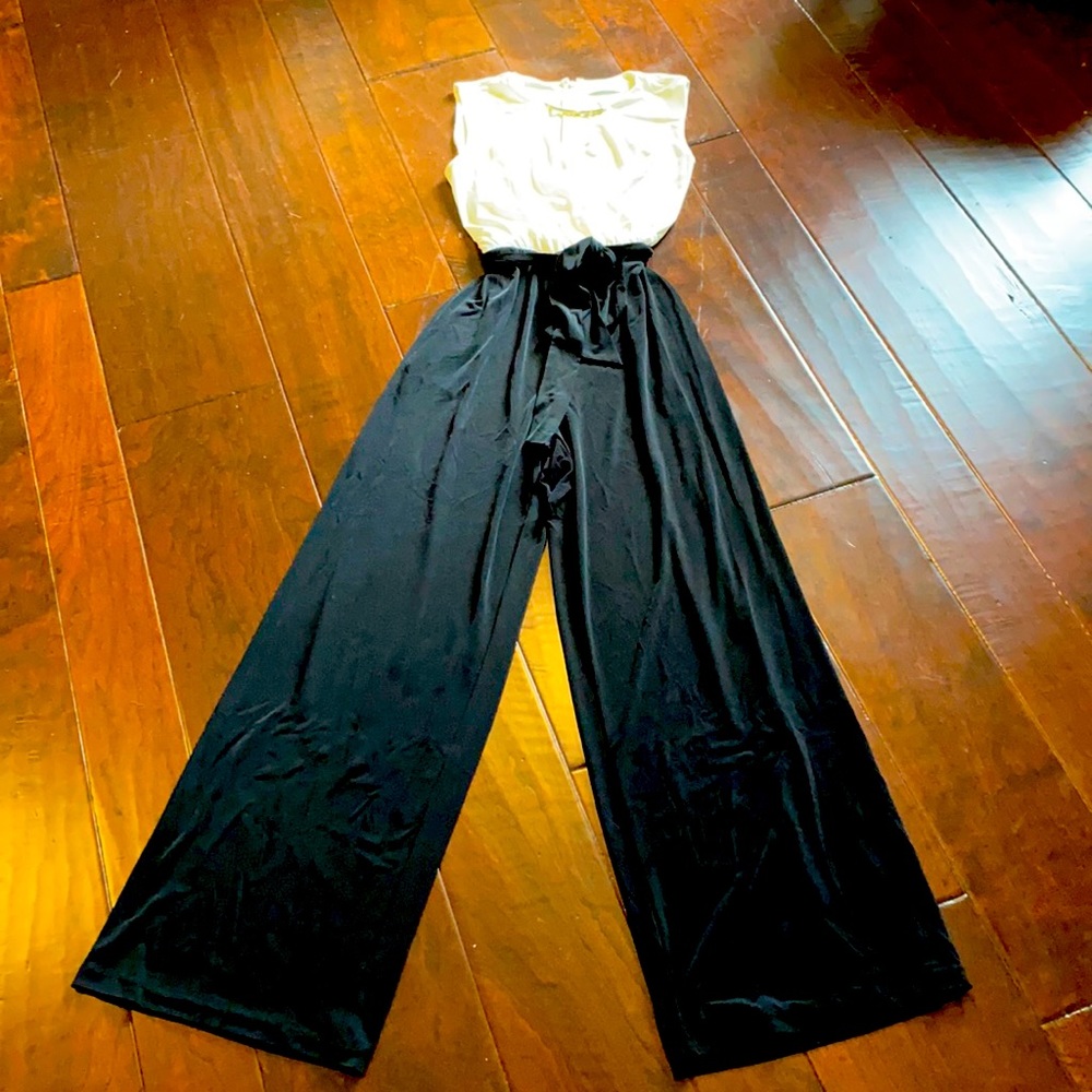 Calvin Klein 1 piece jersey fabric jumpsuit-creme top & black pant w/ tie waist